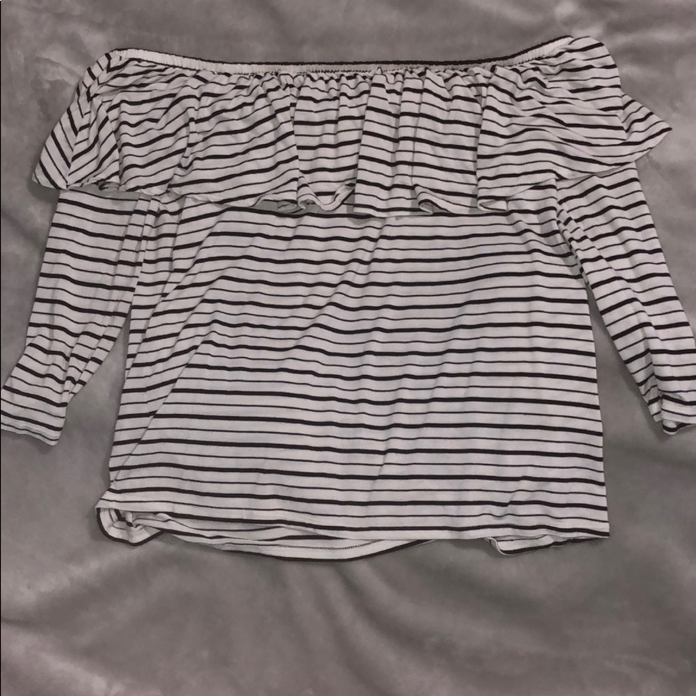 Off the shoulder long sleeve shirt.